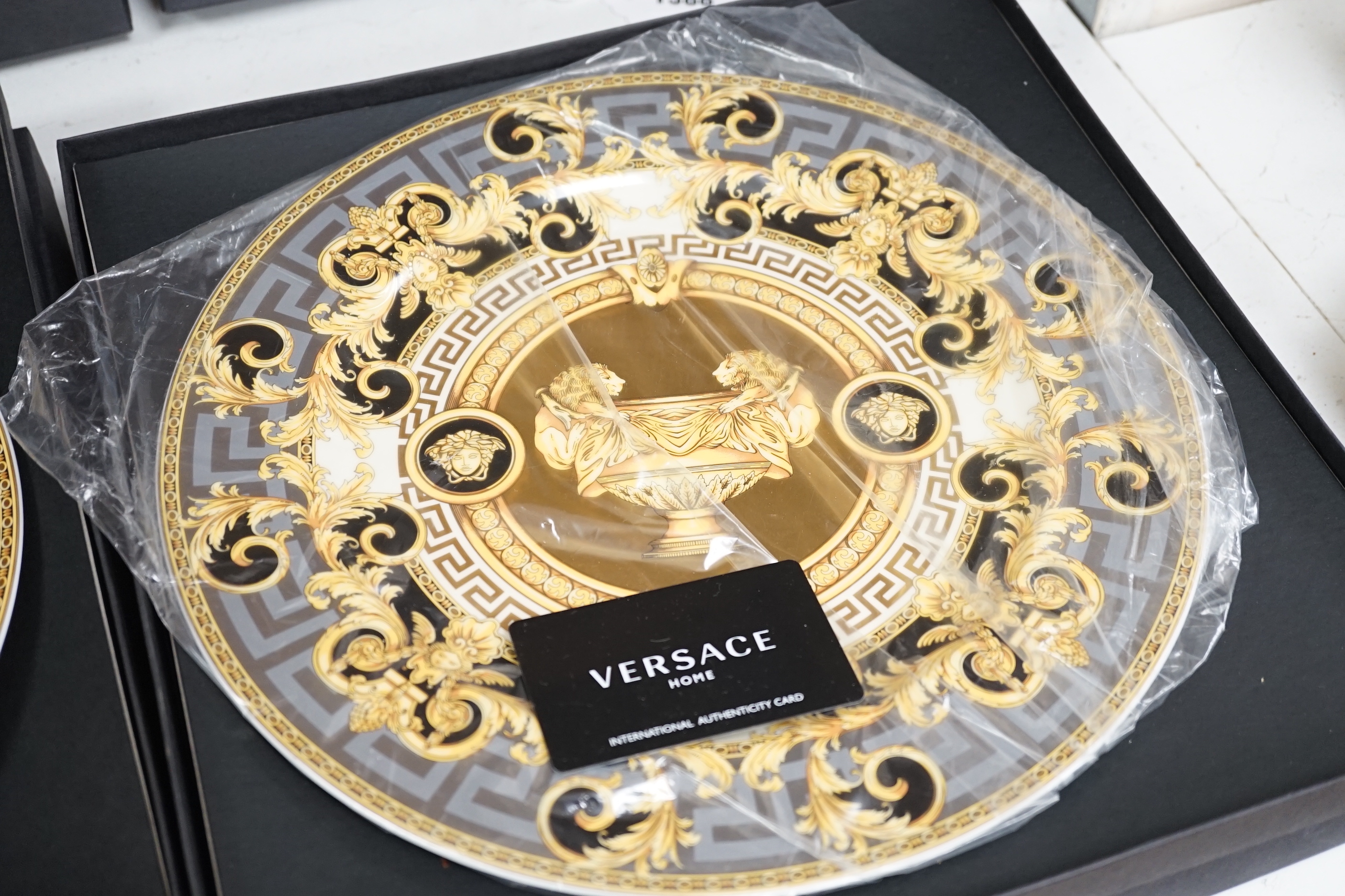 Four Rosenthal porcelain Versace ‘Prestige Gala’ plates, 30,5cm diameter (boxed)
